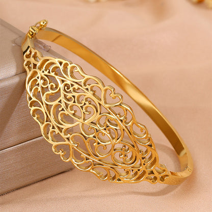 Titanium Steel Gold Plated Hollow Carved Bracelet