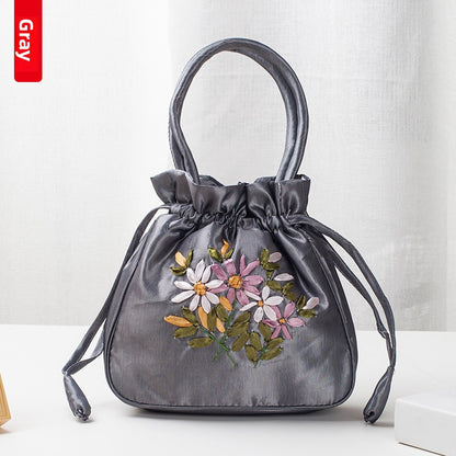 Hand-Embroidered Floral Drawstring Clutch Bag