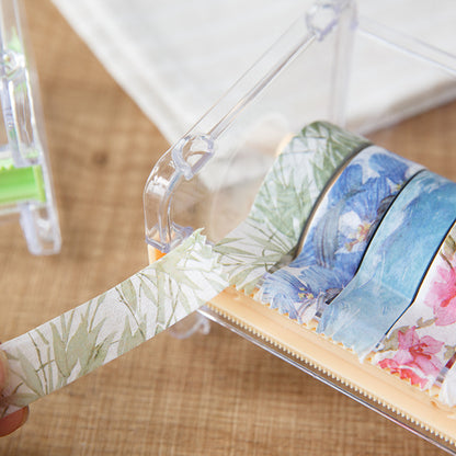 Multi-use tape holder tape cutter