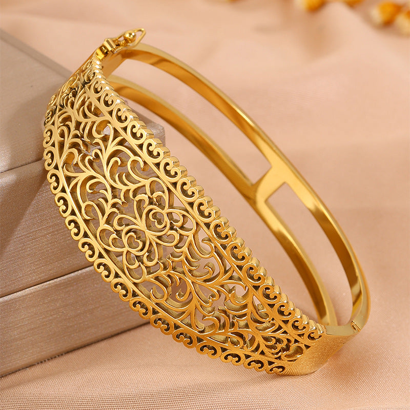 Titanium Steel Gold Plated Hollow Carved Bracelet
