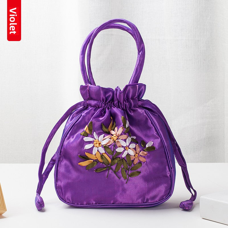 Hand-Embroidered Floral Drawstring Clutch Bag