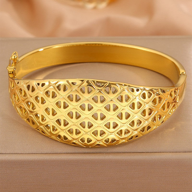 Titanium Steel Gold Plated Hollow Carved Bracelet